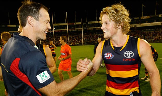 Brenton Sanderson celebrates with Rory Sloane